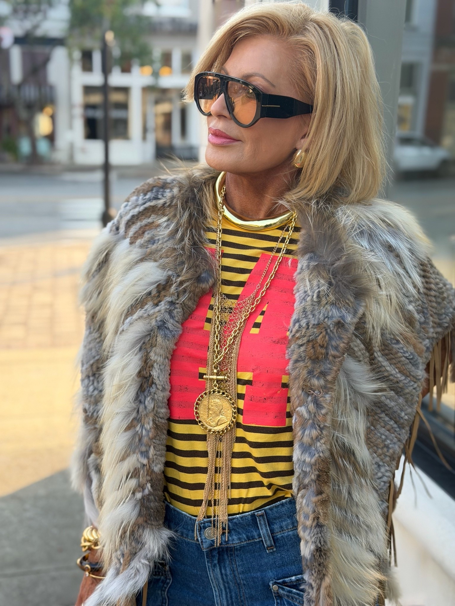 Style doesn’t know an age limit. I love a good graphic to add interest to an outfit.  I sized up to a lg in my tee & my fur poncho is one size.

#LTKootd #LTKvlog #LTKOver40