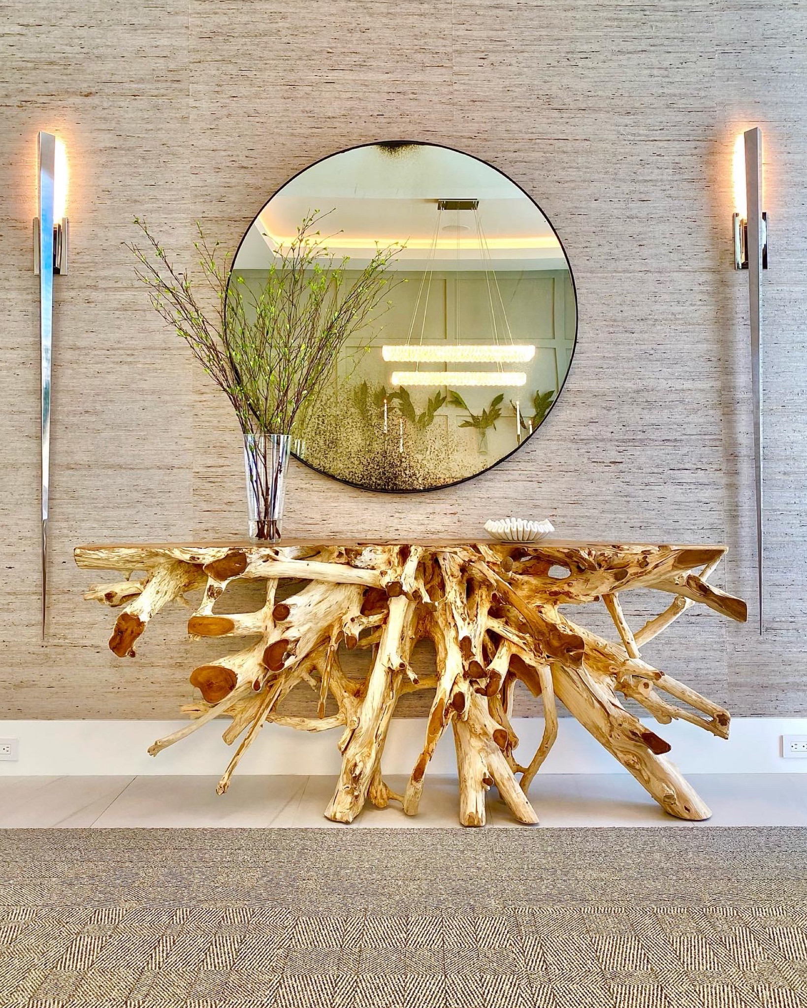 Mixing styles isn’t out of style. Combining textured wallpaper, a live edge console table, modern sconces  and an antique mirror is forever a welcoming foyer    

#LTKhome #LTKfamily #LTKSale