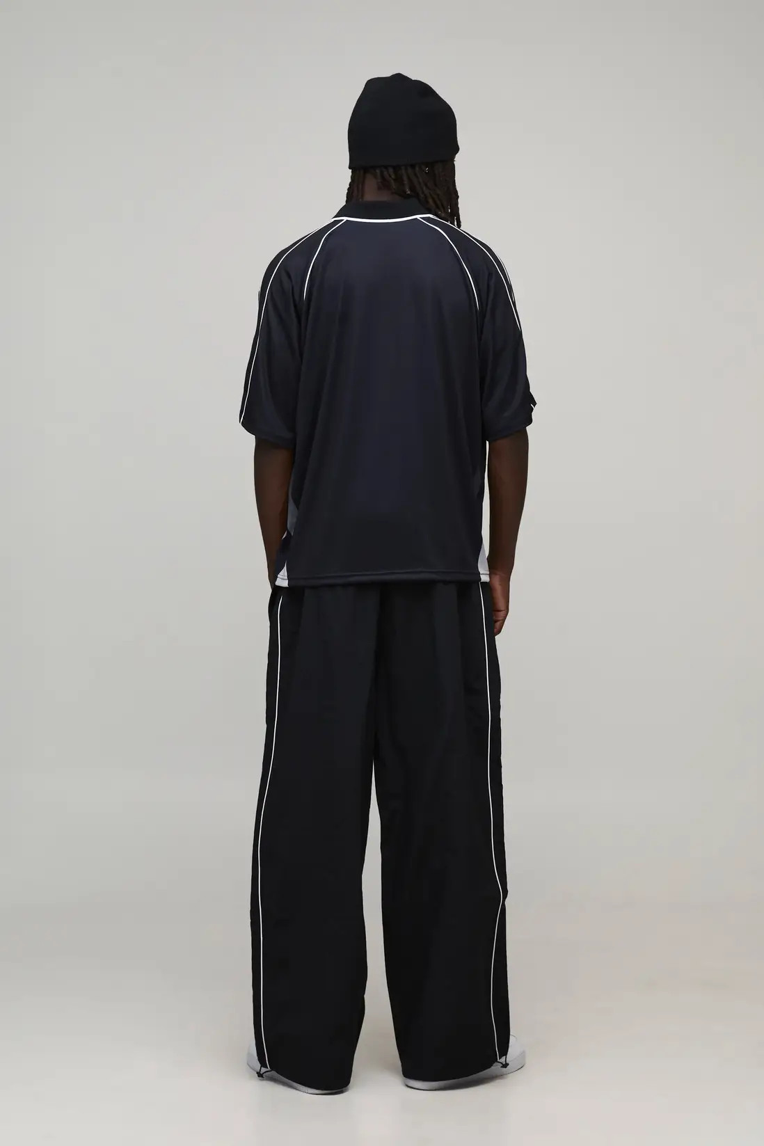 Black boohooMAN Parachute Fit Nylon Piping Detail Track Pants | Boohoo USA | boohoo (US & Canada)