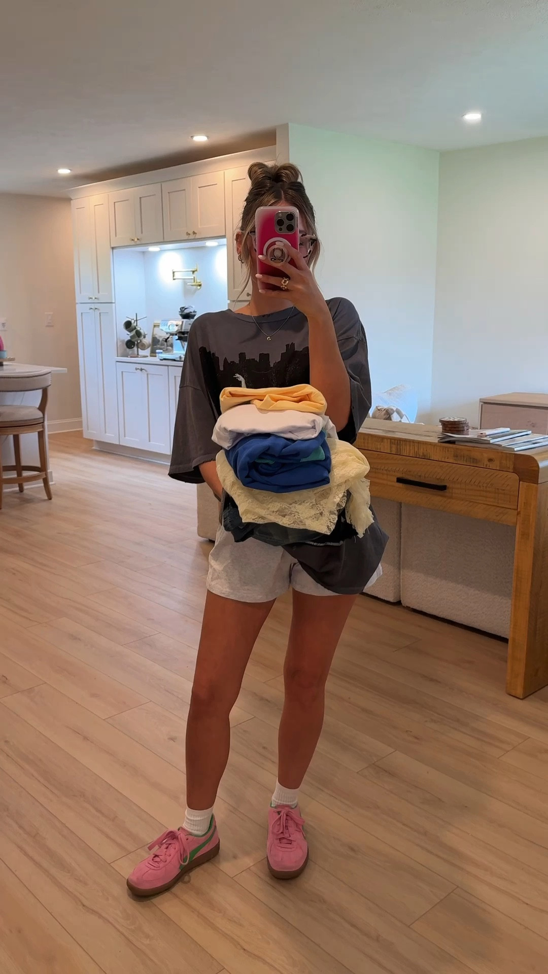 Styling Recent Amazon Finds - Part 1! The grey tee is one size and grey shorts are size medium. I sized up bc they run small. Im wearing size large in the blue crew neck. Large in the yellow band tee and small in the lace skirt. I’m wearing size large in the white and blue tee for an oversized fit & size 25 in the Jean shorts - these run small so I size up! I’m wearing size small in the be my baby tee and size 24 in the free people pull on pants, true to size for me. I’m wearing size large in the yellow tee and size medium in the shorts. They run small so I size up. 

#LTKfindsunder50 #LTKfindsunder100 #LTKstyletip