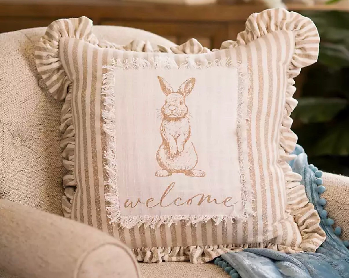 Celebrate Easter with this Striped Welcome Bunny Ruffle Pillow. Accented with ruffled trim, it adds the perfect spring charm to your sofa or accent chair!

#LTKHome #LTKSeasonal
