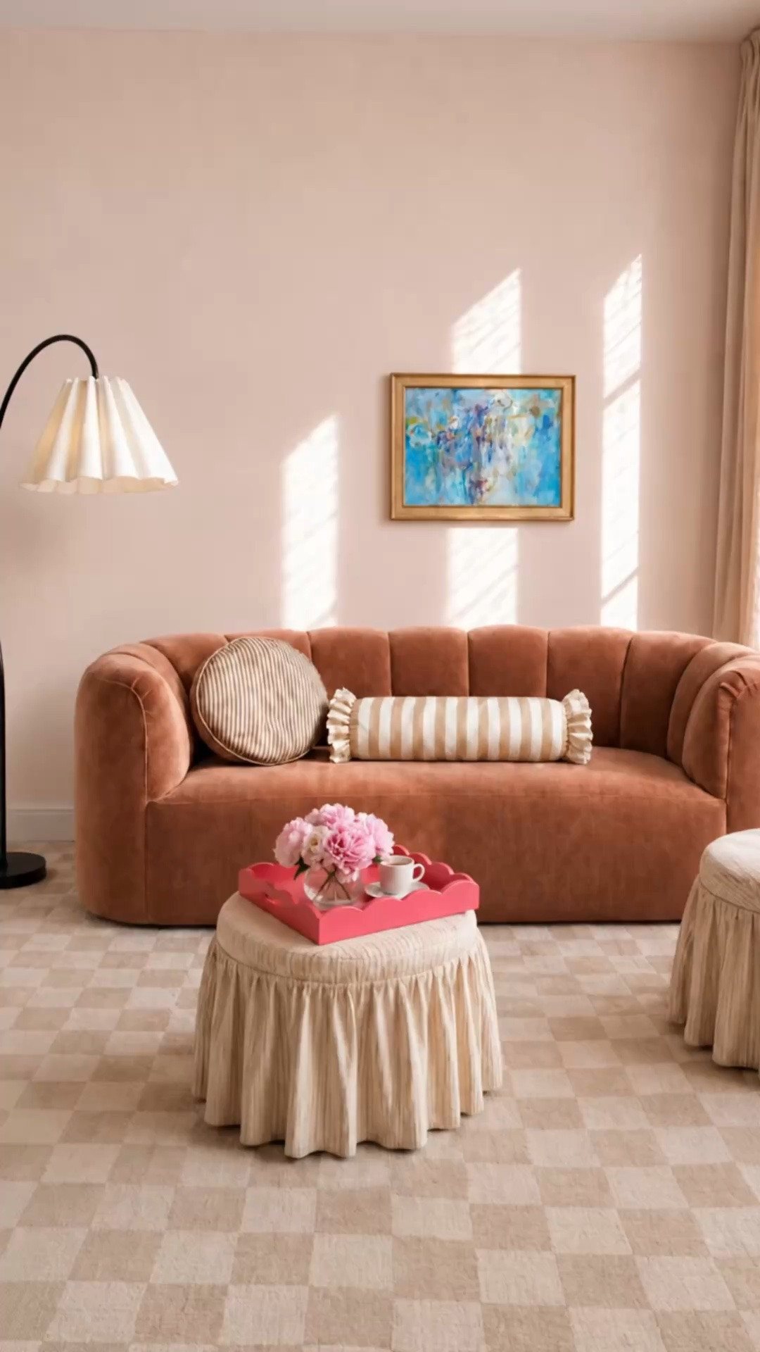 Imagine starting your morning here with a cup of coffee as soft sunshine moves across the room. The brown velvet loveseat brings in that rich jewel-tone depth, while watermelon pink accents add energy and personality. And because we’re still transitioning from summer, the blue artwork keeps the whole space feeling bright, airy, and connected to the season we’re still in.

This is one of my favorite ways to begin refreshing a home for fall — don’t change everything at once. Start with one corner and layer in a few richer tones through a loveseat or accent chair, then build around it with pillows, artwork, and smaller accessories. Even something as simple as a watermelon-pink tray can introduce a stronger seasonal color without making the room feel too heavy too soon.

The pleated floor lamp adds softness and shape, the checkered rug gives the room subtle pattern, and the mix of brown, pink, lavender, and blue creates that in-between-season mood — still light enough for summer, with just enough richness to hint at fall.

#MorningCoffee #CoffeeMoment #JewelTones #FallTransition #VelvetLoveseat #AccentChair #ThrowPillow #Artwork #DecorativeTray #PleatedFloorLamp #Drapes #CheckeredRug #LivingRoom #HomeDecor #InteriorDesign

#LTKdayinmylife #LTKHome #LTKSaleAlert