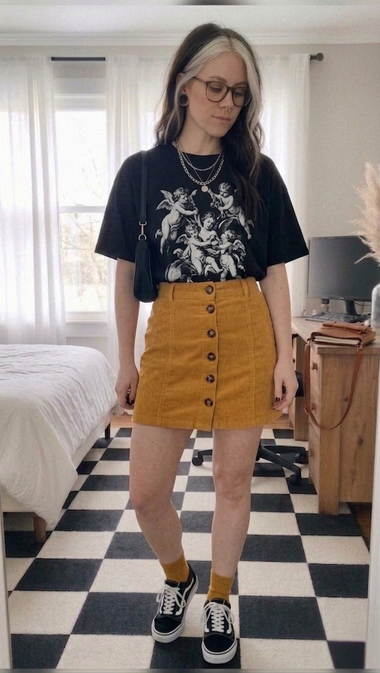 Obsessed with this mix of edgy and sweet! This button-down corduroy mini skirt in mustard is the perfect pop of color against a classic Renaissance cherub graphic tee. I paired it with my go-to Vans Old Skool sneakers and matching mustard socks for a cohesive, street-style vibe.

#LTKMidsize #LTKootd #LTKSeasonal