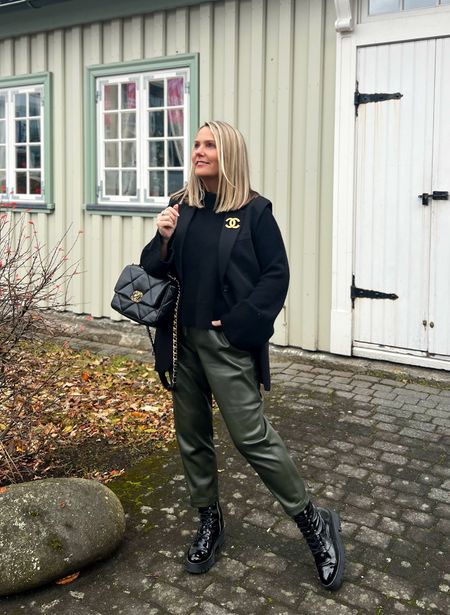 Sleeveless blazer, mock neck sweater, faux leather pants and combat boots in black and olive green.
 


#LTKfindsunder100 #LTKstyletip #LTKshoecrush