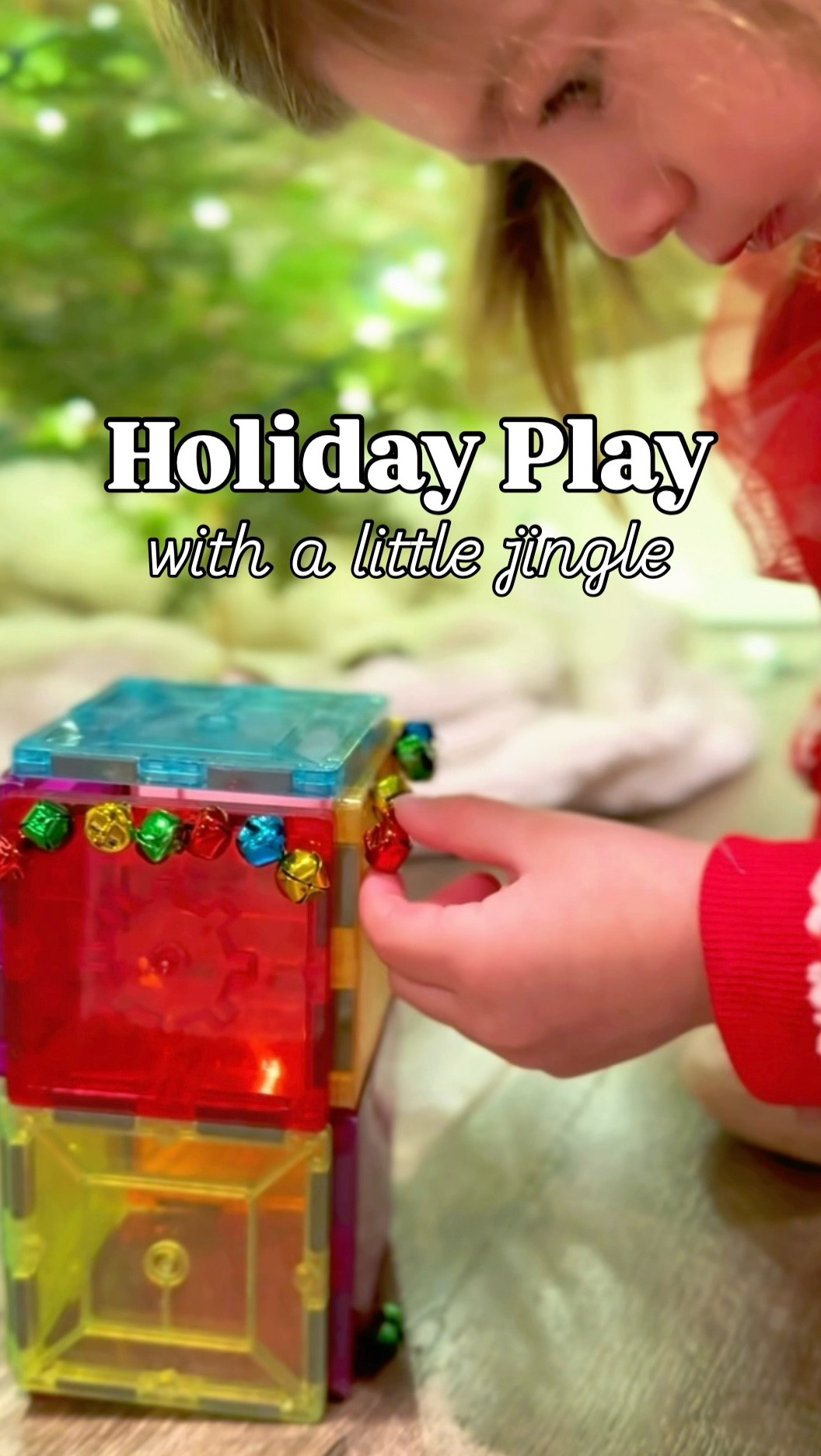 Magnetic tiles take on a whole new kind of holiday magic when you add jingle bells.
The click of magnets, the gentle jingle, the pause before the next move.

This is hands-on learning, fine motor practice, and sensory exploration wrapped into a cozy seasonal invitation.
No rush. No expectations. Just slowing down and enjoying the magic of the holidays together.

If you want to add a little more magic, try sparkling pipe cleaners, snapping on ABC magnets, or adding other magnetic loose parts like washers.
Simple additions can turn familiar tiles into something new — and keep the wonder going just a little longer.