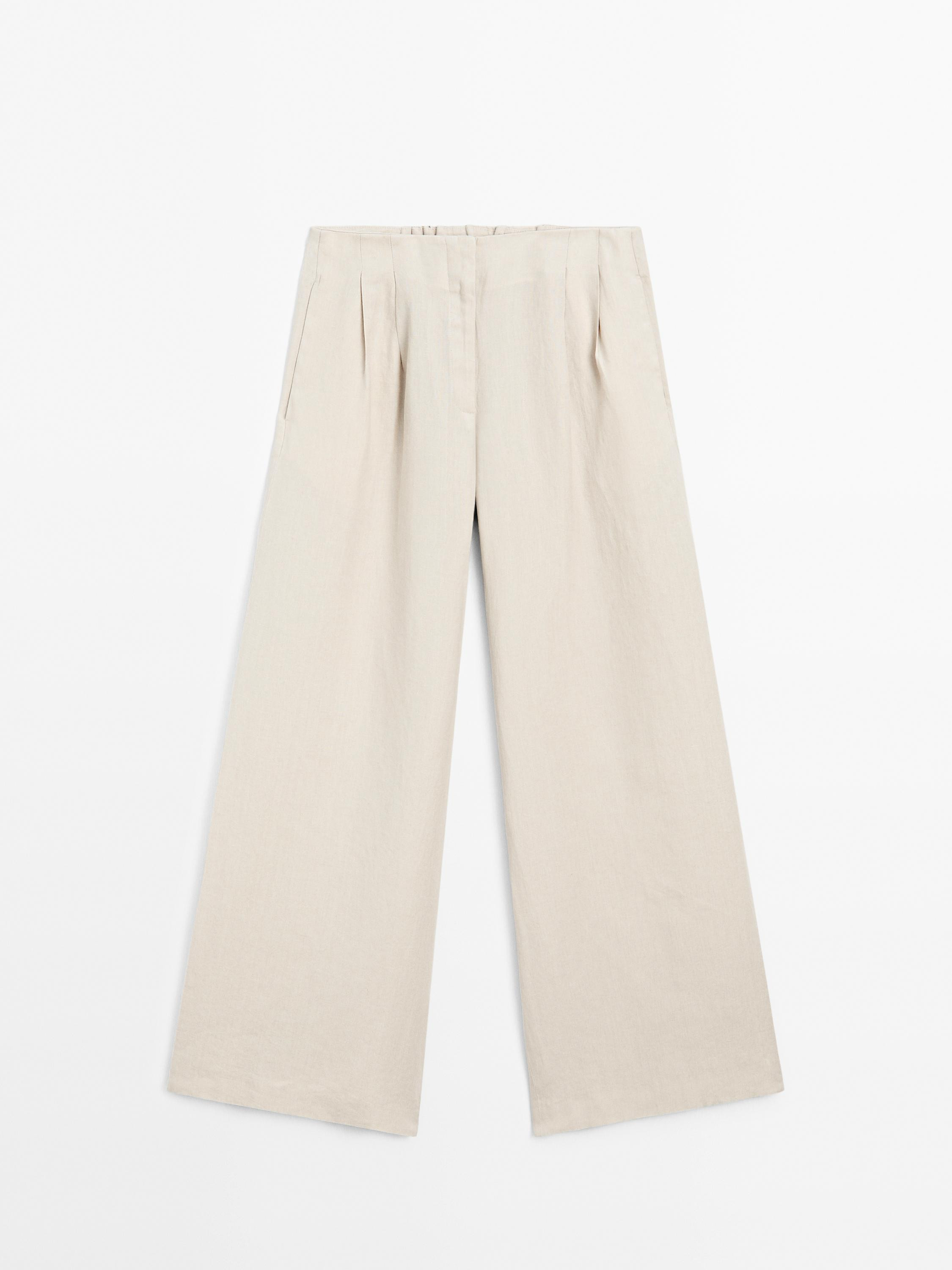 Trousers made of 100% linen.. Mid-waist. Zip fastening concealed by a placket, with hook-and-eye ... | Massimo Dutti UK