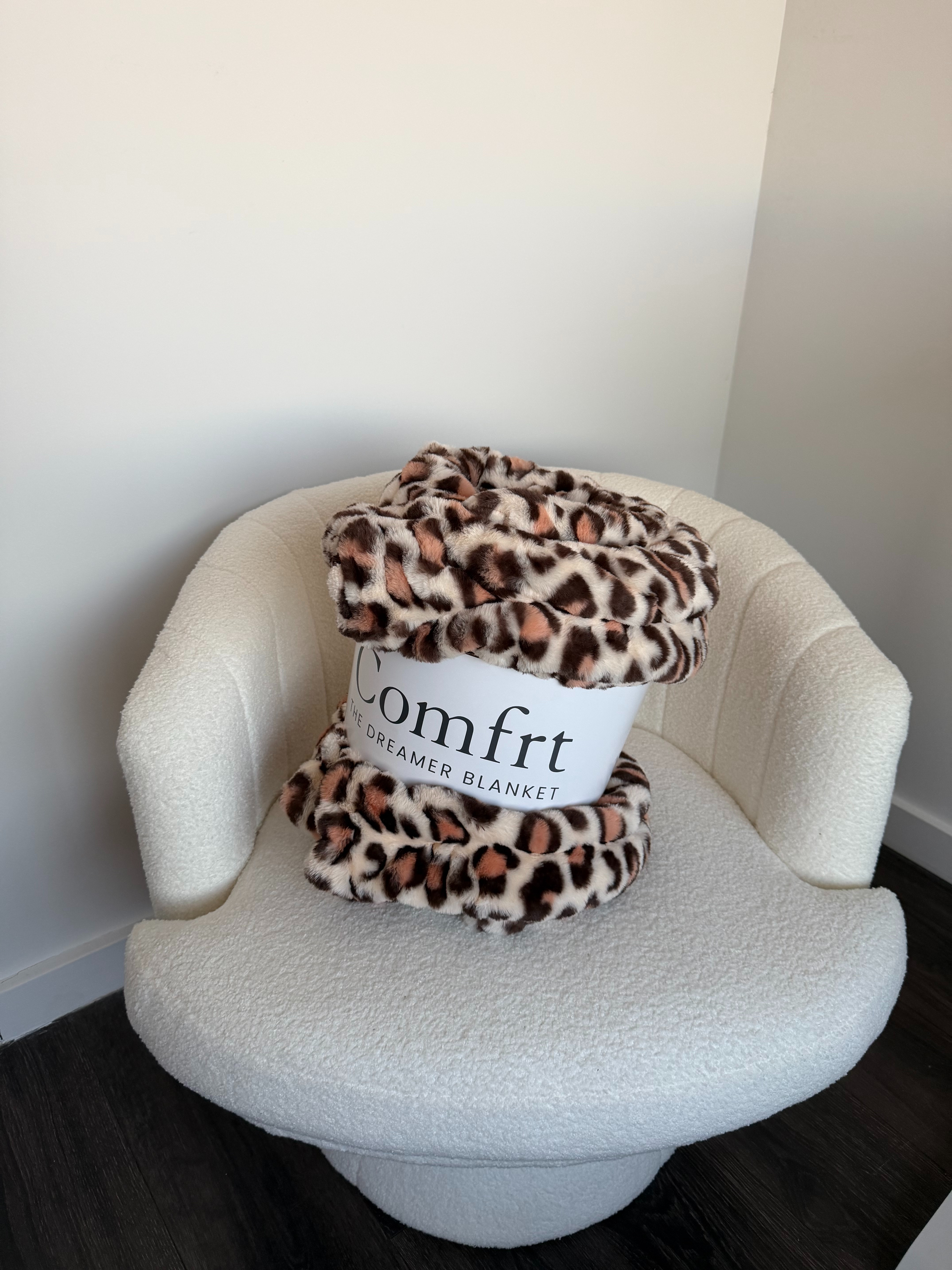 The Dreamer Blanket in brown leopard 🐆 I'm 5'5 for reference — this one's the medium size. So soft on both sides. 

 #LTKdayinmylife #LTKHome