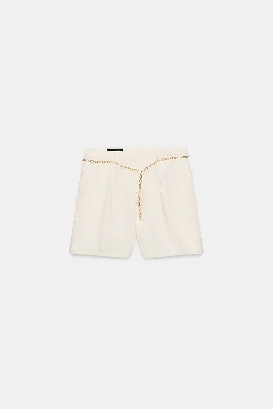 High-waist Bermuda shorts featuring front pleats and a chain belt. Front pockets, false rear welt... | Zara IT