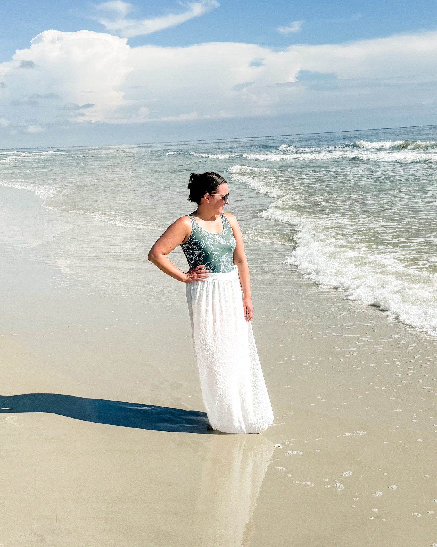 Beach vacation outfit / summer outfit / green one piece swimsuit / white tie waist swim cover up skirt / black sunglasses / mom outfit / full coverage swimwear 

#LTKTravel #LTKSwim #LTKOver40