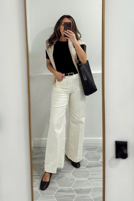 Ecru wide leg jeans tts for me (for Talbots sizing). Wearing size 2. They have stretch to them.  Use code MOM for extra 40% off  
Flats tts - leather is so soft. 
Sweater tts 
Tee super old but linked identical styles. 
Favorite leather tote - soft leather 🤌🏼. I have the mini version too and it’s a great everyday bag.  Linking it too. 
My belt is old - linking great alternatives 

#LTKshoecrush #LTKitbag #LTKxMadewell