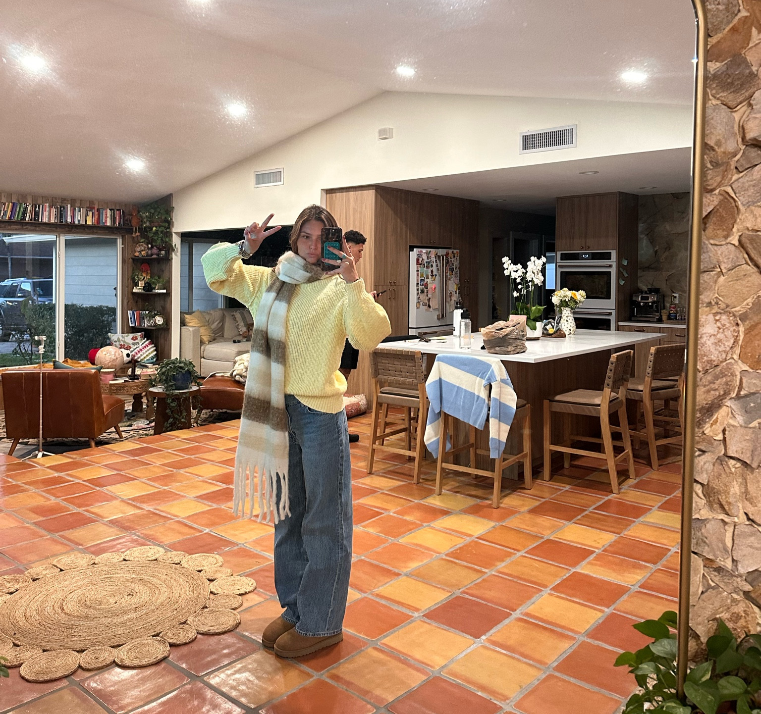 Packing for a trip somewhere cold. Love this little yellow sweater. Wearing a Medium. These jeans are the BEST. I’m 5’8 wearing a 25 Long and they are a perfect fit✨⭐️💫