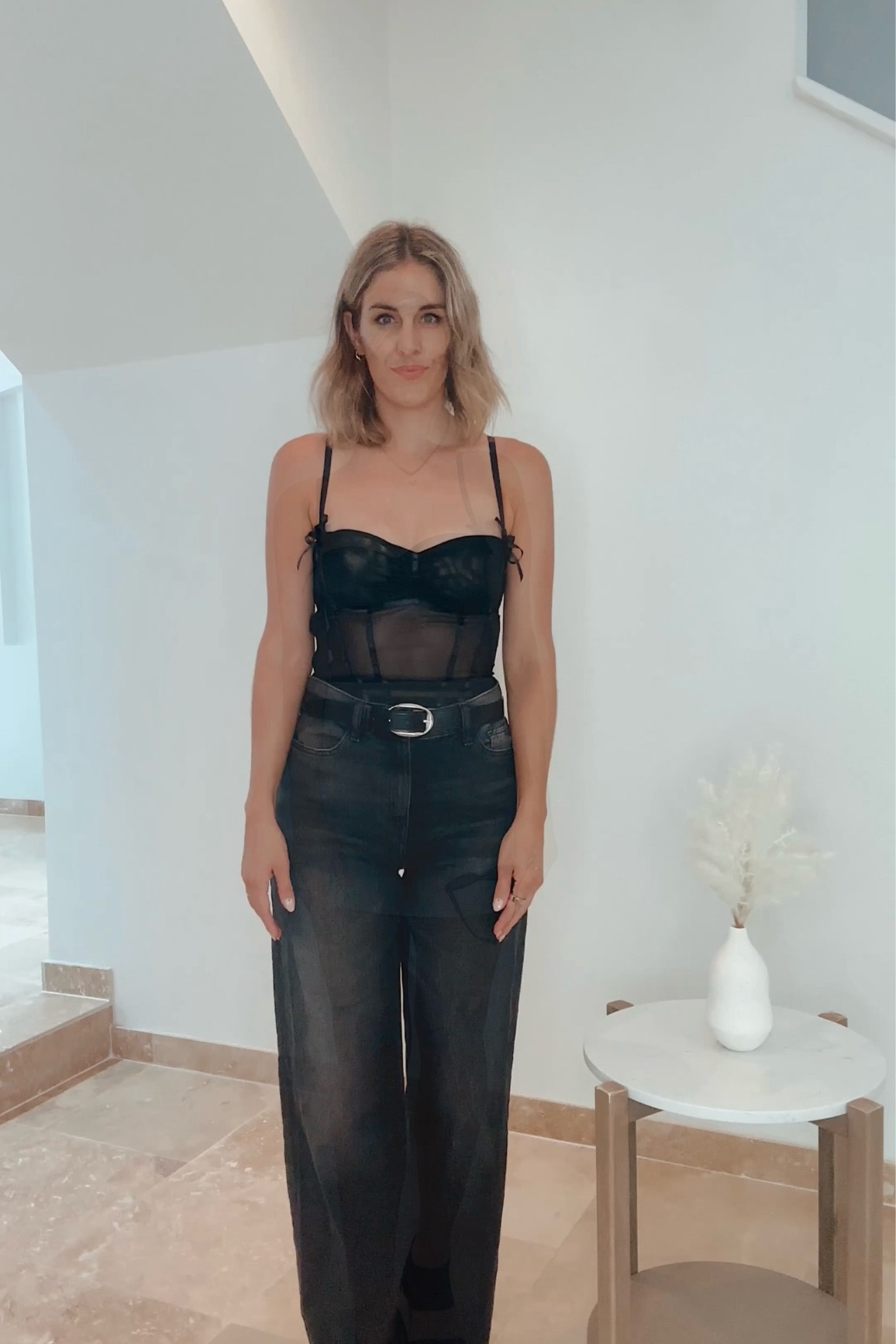 Black corset top black jeans 