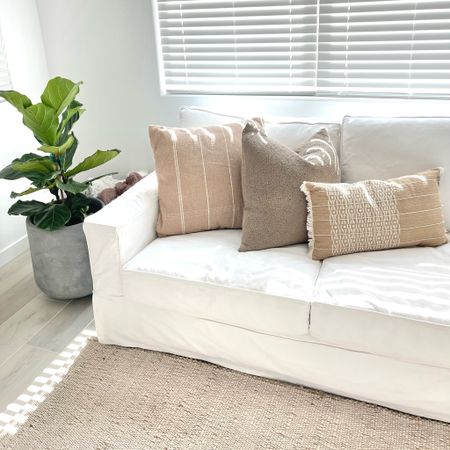I finally found some affordable neutral throw pillows I like! These are $30 and under and include inserts! They work perfect in my living room to warm up my white sofa. New Studio McGee at Target! 

#LTKunder50 #LTKhome #LTKFind