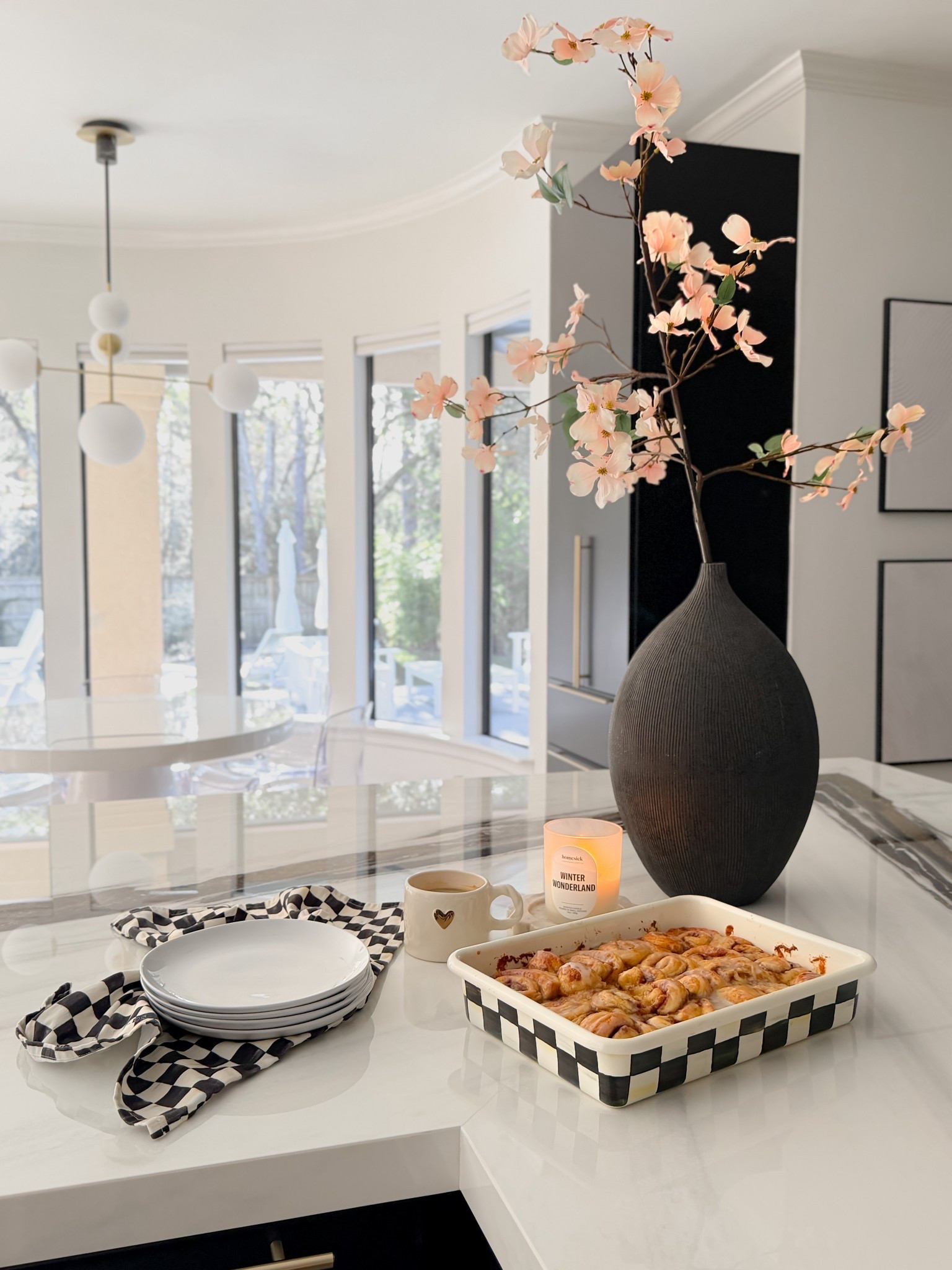 A slow winter morning ⛄️☕️ 

INGREDIENTS
 
2 tubes store bought cinnamon rolls (I recommend Pillsbury Grands Cinnamon Rolls With Cream Cheese Icing)
1 cup heavy cream
baking spray
½ stick butter melted 
½ cup brown sugar
½ teaspoon cinnamon

INSTRUCTIONS
 
Preheat oven to 350F degrees.
Spray large baking dish with nonstick baking spray and place cinnamon rolls in.
Pour the heavy cream over the top of the cinnamon rolls.
Mix remaining ingredients minus the frosting, then evenly distribute over the top of the buns. 
Place in the oven and bake for 25-30 minutes.
Remove from heat and add icing. 
Serve immediately.

#LTKdayinmylife #LTKfoodie #LTKHome