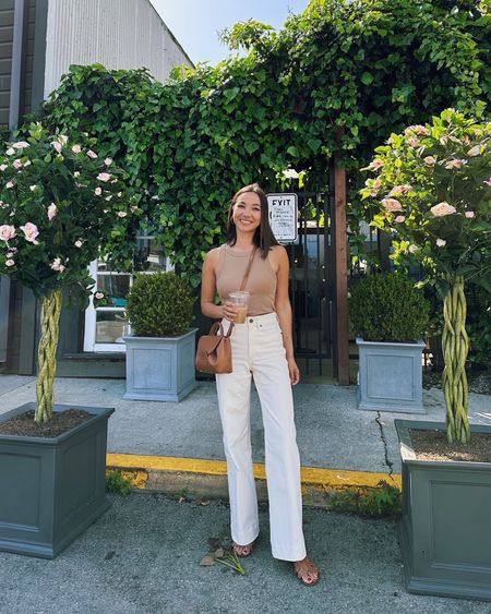 Casual summer outfit/coffee date 

• tank - xs, linked to similar styles 
• MMLaFleur Milo jeans - linked to similar, more affordable styles 
• Sam Edelman bay slide sandals 
• Polene purse (can’t link) 

#LTKstyletip #LTKSeasonal