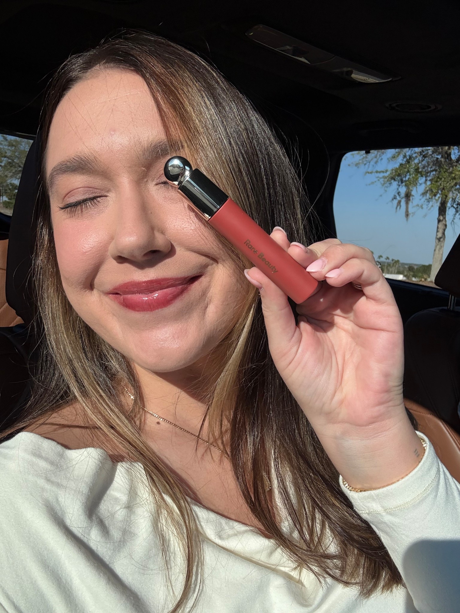 My favorite lip oil from Rare Beauty!