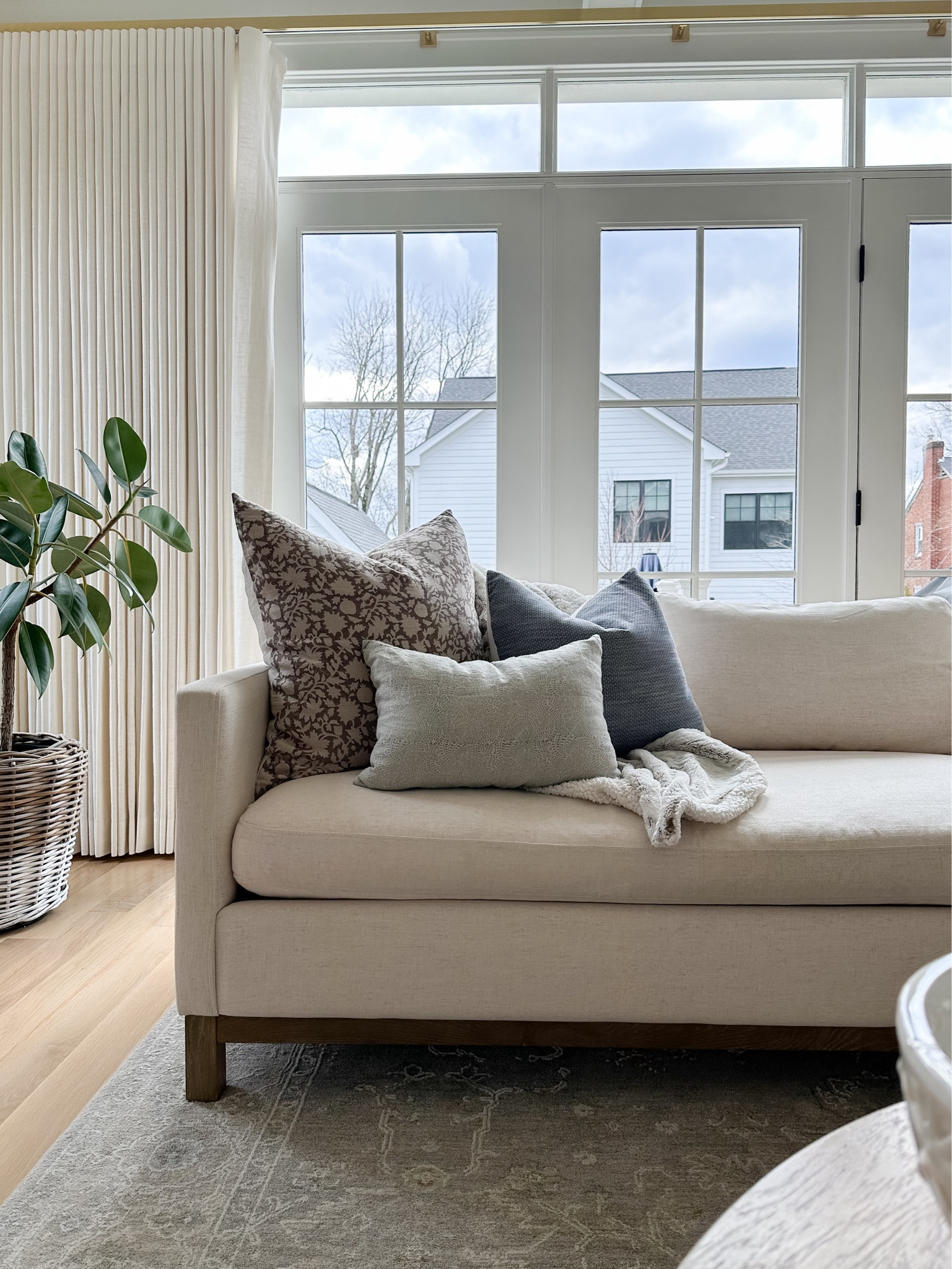 Cream loveseat, throw pillows, linen curtains in ivory, neutral home, woven planter, affordable finds 

#LTKstyletip #LTKhome #LTKsalealert