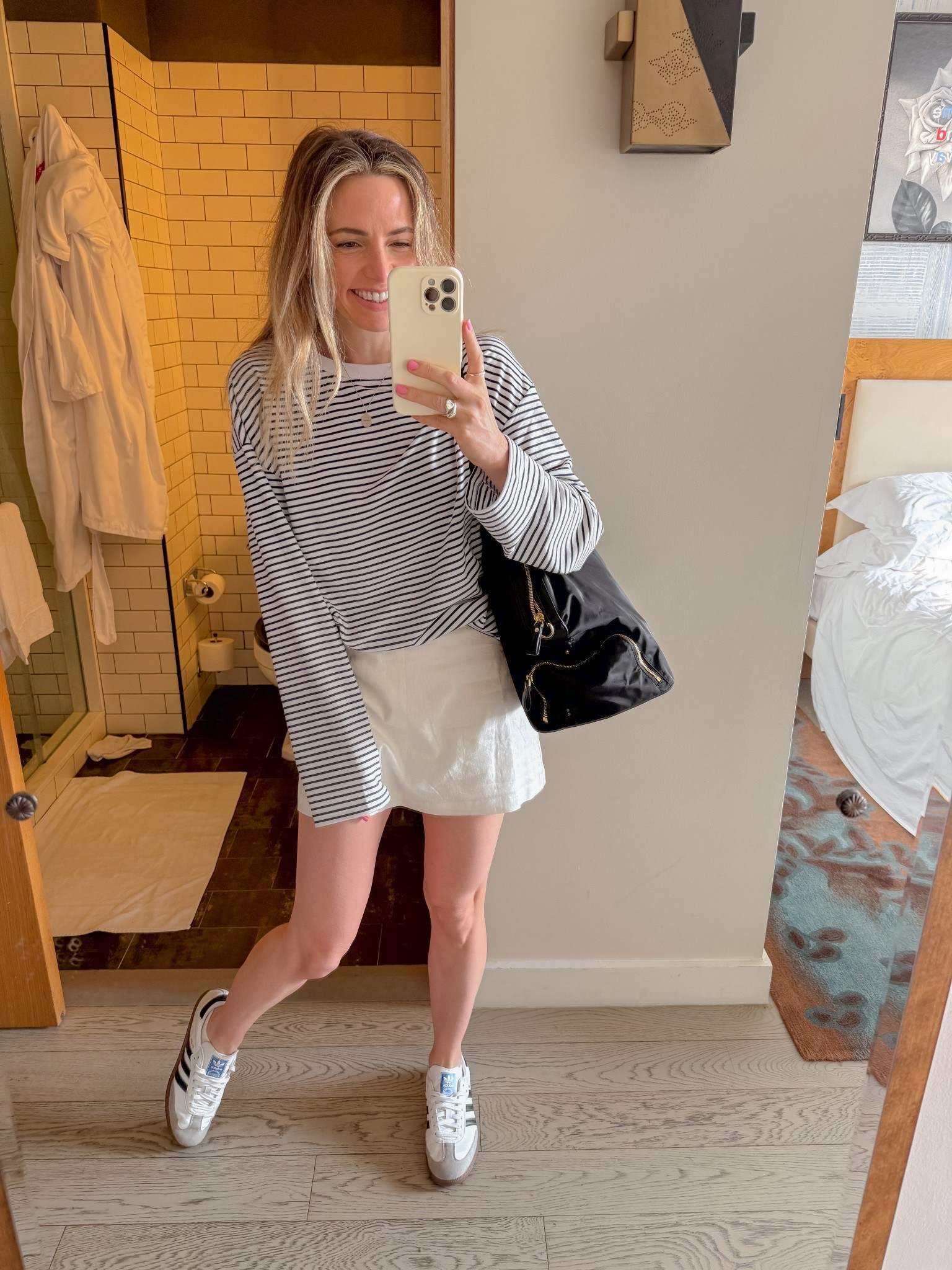 a little comfy casual fall transitional outfit for a day working from my friends office and showroom in Brooklyn. This easy, comfy outfit was perfect for being comfy (the shirt is so soft) while working from my best friend’s showroom + office in the city. the striped long sleeve with a mini skirt + Sambas is such a good combo to keep it casual but still put together.
	•Wearing size small in both pieces
	•Striped top is soft + relaxed for all-day wear
	•Linen mini skort is lightweight, comfy, and effortless to style
	•Vegan Sambas keep it sporty + chic
Linked the look here so you can shop it 🤍
#falloutfits #fallfashion #sambasoutfit #stripedlongsleeve #casualoutfit

#LTKTravel #LTKWorkwear #LTKSeasonal