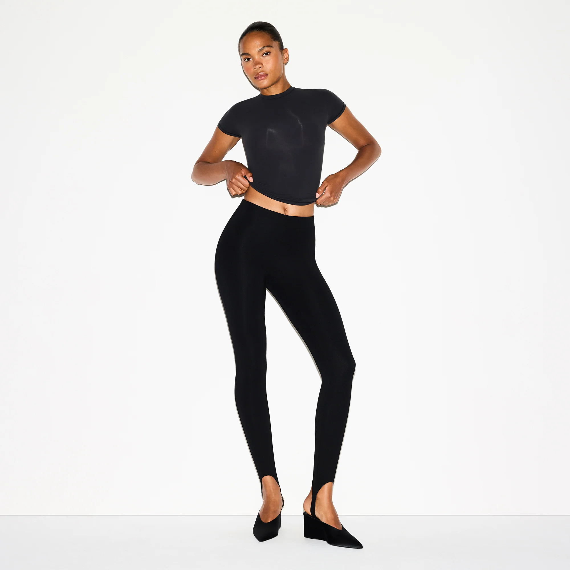 SKIMS High-Waisted Stirrup Legging | Black | Large | The Essential Collection | SKIMS (US)