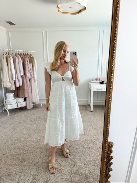 This Target dress is giving me all the bridal vibes! A great option for a spring time bridal shower or bridal luncheon! I have it dressed casually with these adorable sandals. Would also be so cute dressed up with heels! Run tts, I’m wearing a size small! 

#LTKwedding #LTKxTarget #LTKSeasonal