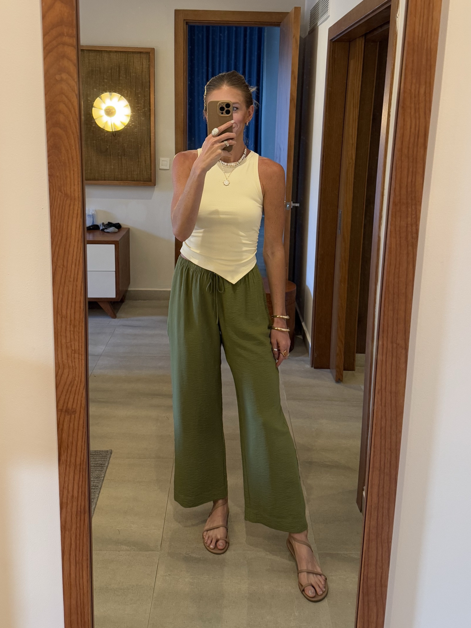 Small in top
I wanted a cropped high rise pant so I’m wearing small regular. If you want a full pant then I would get a small long but they will be low risee