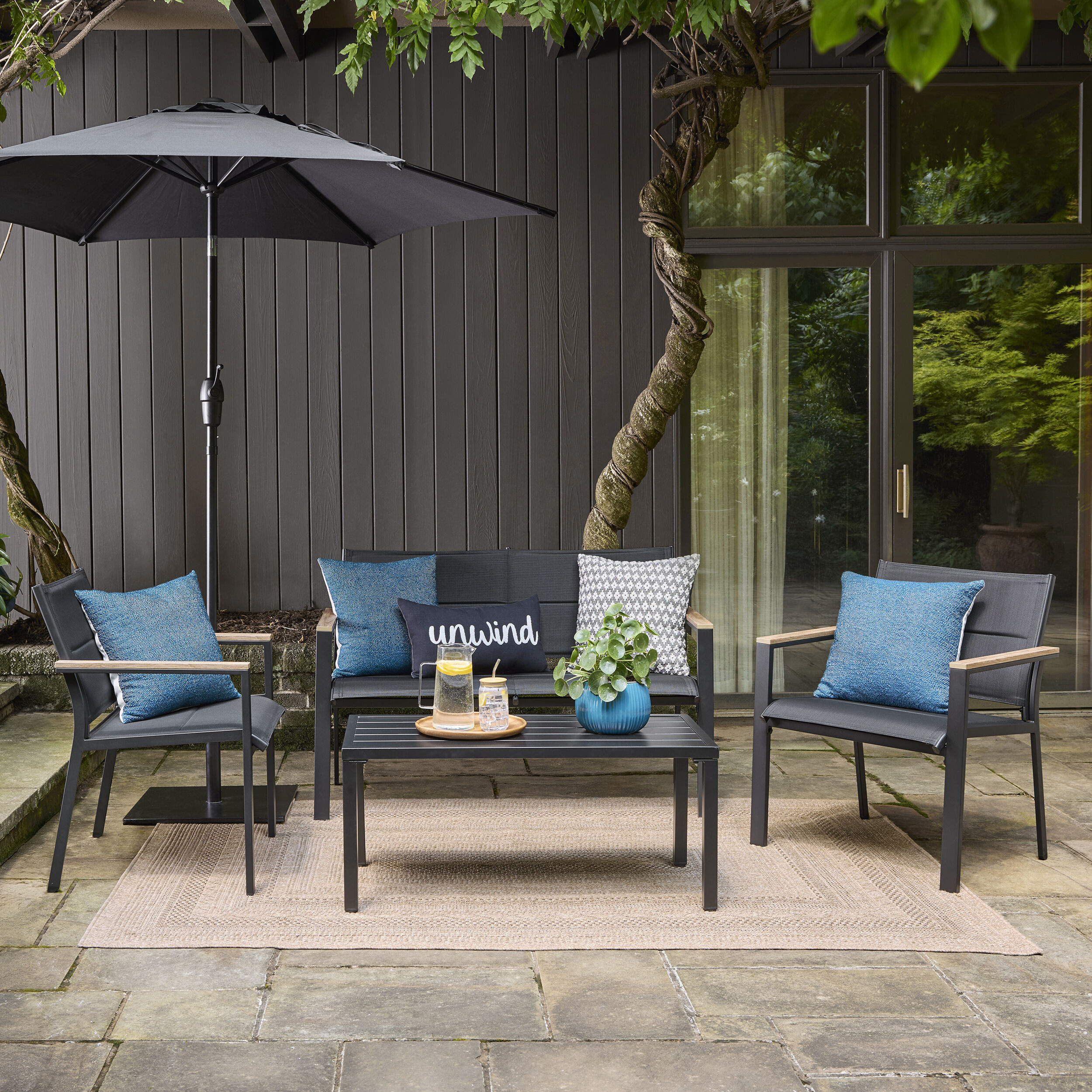 Style Selections Wade 4 -Piece Patio Conversation Set with Black | Lowe's