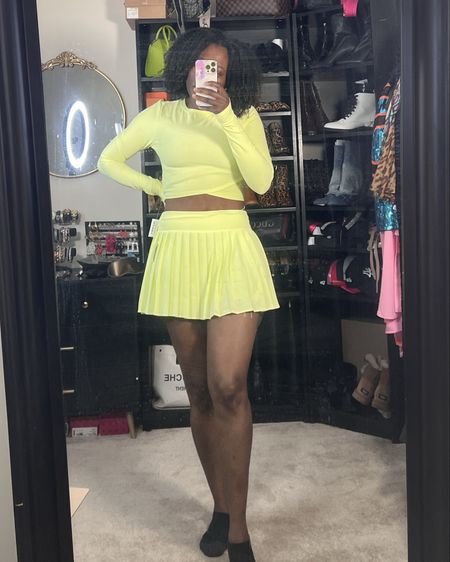 Pleated Skorts are trending!!! Gives the feeling of a mini skirt with coverage!! I love the vibrant colors. 

#LTKstyletip #LTKfindsunder50 #LTKfitness
