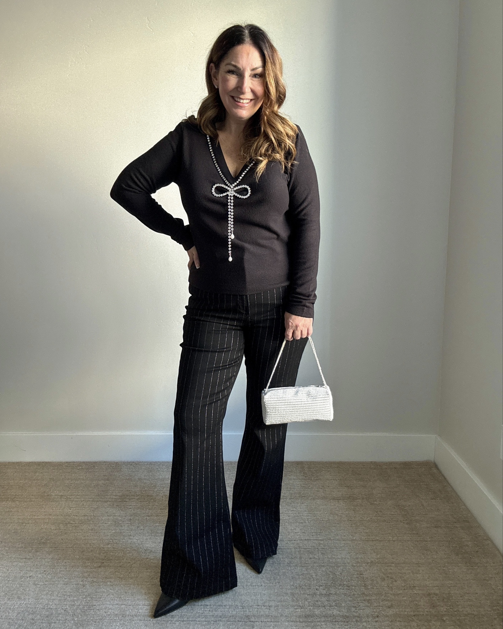 LOFT Bow Holiday Dressy Pants Outfit | Wearing sweater tts, L and Pants tts, 31R. #holidayparty #holidayoutfit #festiveoutfit 

 

#LTKHoliday #LTKSeasonal #LTKMidsize