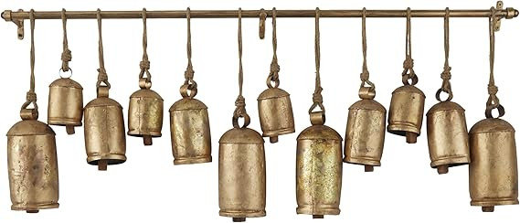Deco 79 Metal Decorative Cow Tibetan Inspired with 12 Bells on Jute Hanging Ropes and Rod, 48" x ... | Amazon (US)