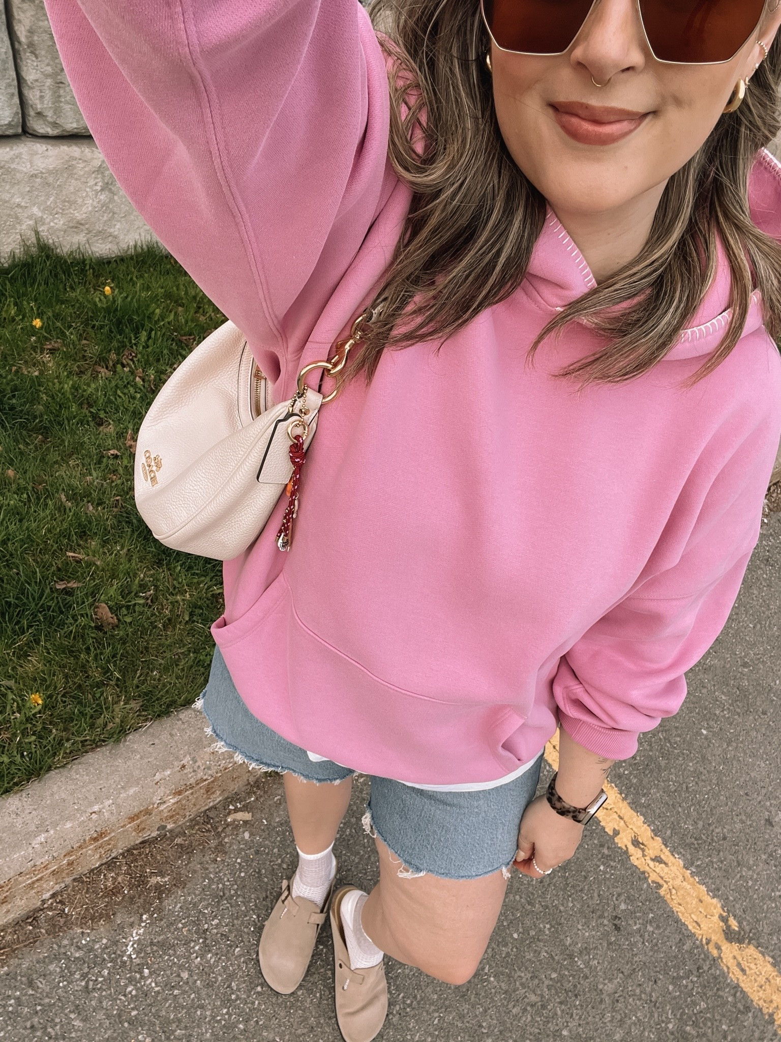 Comfy casual spring outfit! Wearing 32 in the shorts, I recommend sizing up! Also sized up in the pink hoodie for an oversized fit. Linked similar clogs

#LTKmidsize #LTKstyletip