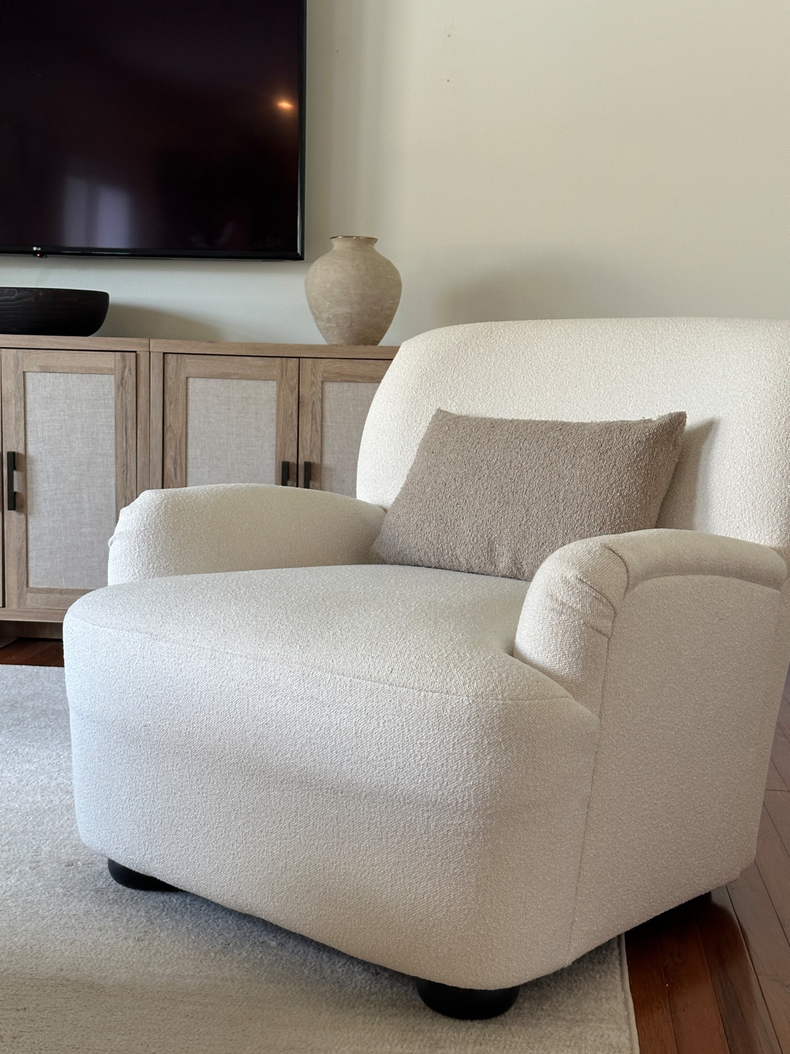 Under $200 ($168 on sale!) white boucle accent chair! 

#LTKStyleTip #LTKHome #LTKSaleAlert