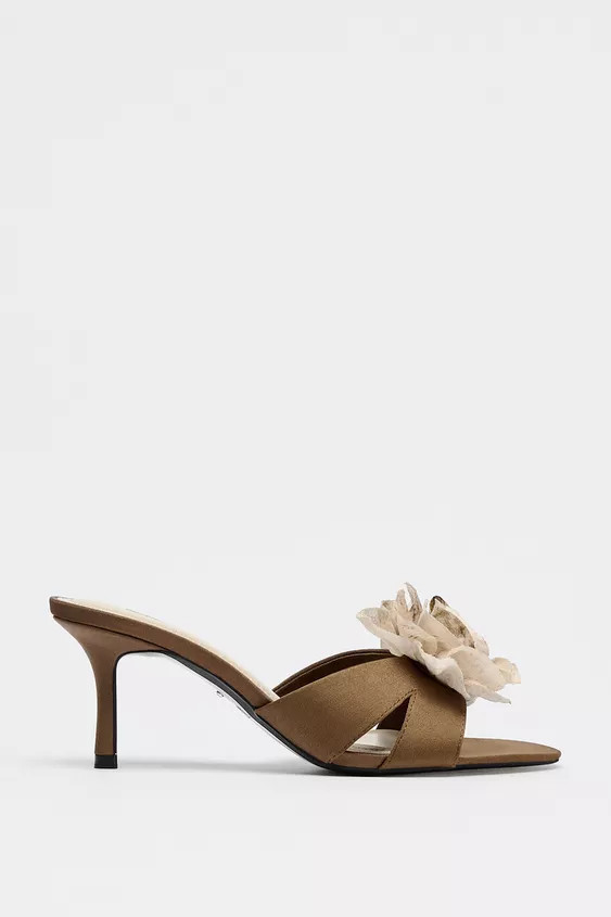 Heeled mule sandals. Strap detail with a large flower on the front. High stiletto heel. Pointed t... | Zara UK