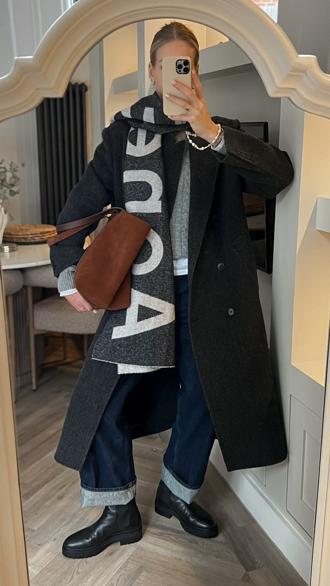 School run outfit - comfy wfh jeans outfit winter 2025!

style tip use a safety pin to keep your scarf in place!

The brown suede bag (now back in stock on Sezane!) and white layered top adds contrast and dimension to a dark grey and black outfit. 


#LTKwinter #LTKbag #LTKstyletip