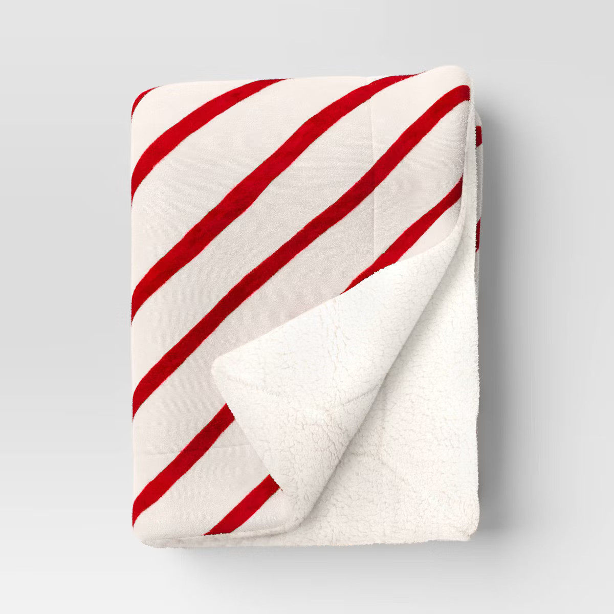 Candy Cane Striped Printed Plush Throw Blanket with Faux Shearling Reverse Ivory/Red - Threshold... | Target
