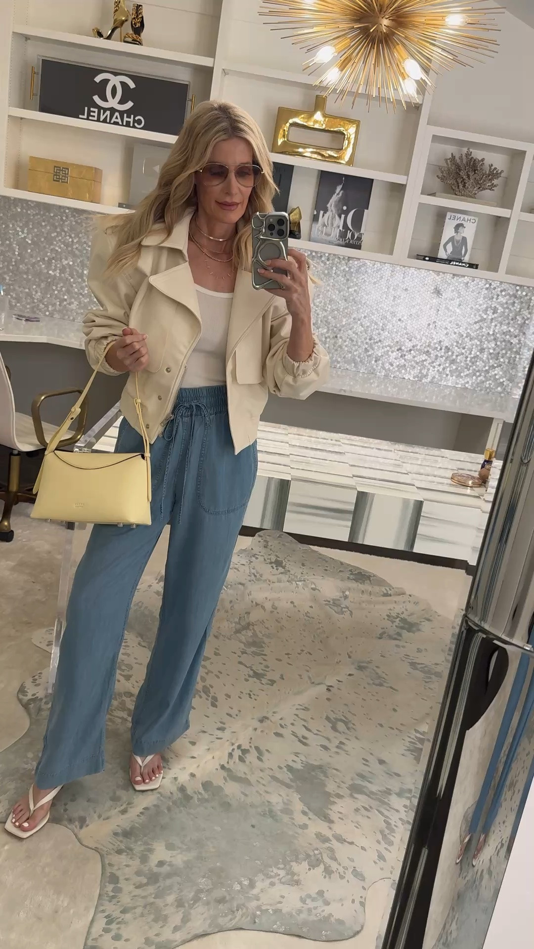 These chambray wide-leg pants are so good styled a little dressier with this ivory jacket that gives Saint Laurent vibes for a fraction of the price! I love the lightweight summer feel of the pants paired with the fashion-forward exaggerated shoulders and polished fit of the jacket for an elevated summer outfit. I’m wearing an XS in the pants and XS in the jacket. #QuinceStyle #WideLegPants #DesignerInspired 
 

 

#LTKOver40