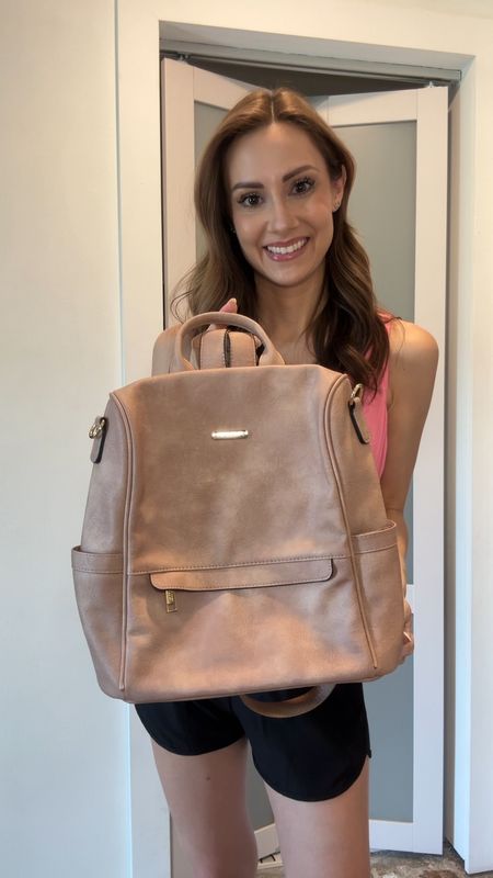 Reviewed this bag on Amazon so wanted to share here too! This bag comes in LOTS of colors!!! I love that the main compartment is hidden so you can only open it from the part facing you! Anti theft, like what!!! I love that the Linking my outfit as well!  Wearing a small in the top and an XS in the shorts! They have zip pockets and built in underwear!!

#LTKItBag #LTKFindsUnder50 #LTKVideo