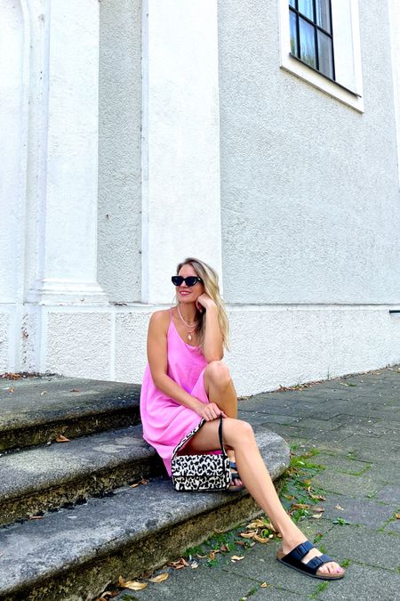 Pink Dress. Fashion Blogger Girl by Style Blog Heartfelt Hunt. Girl with blond hair wearing a pink dress, black slim sunglasses, beaded bag, sea shell summer necklace and Birkenstocks.
#pinkdress #summerdress #colorfuloutfit #colorfulstyle #colorfulfashion #colorfullooks #fashionfun #cutesummeroutfit #summerfashion2023 #summerlookbook #fitcheck #dailylooks #dailylookbook #contentcreator #microinfluencer #discoverunder20k