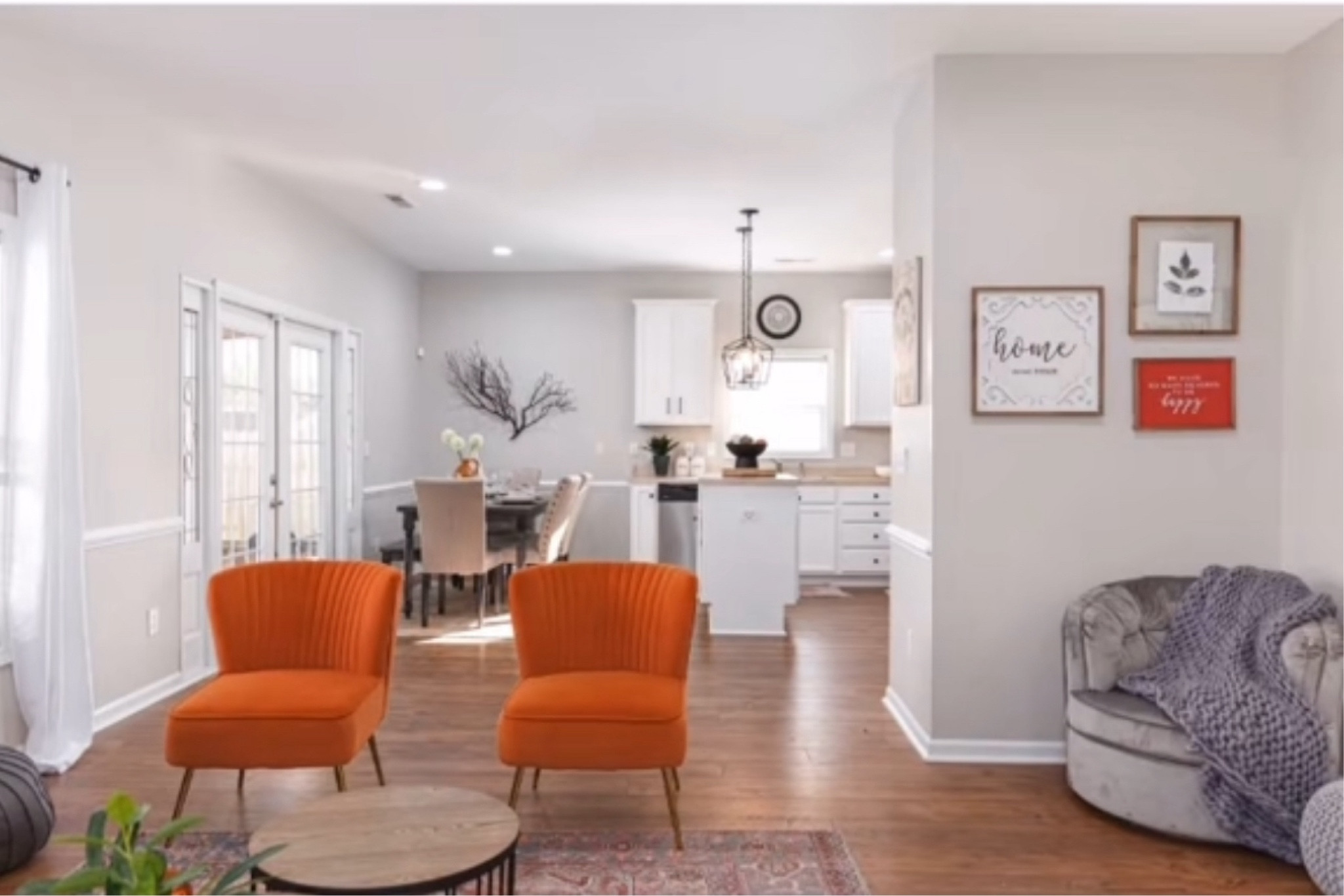 Bold Orange Accent Chairs in a living room space #interiorstyling 

#LTKHome #LTKFamily #LTKStyleTip