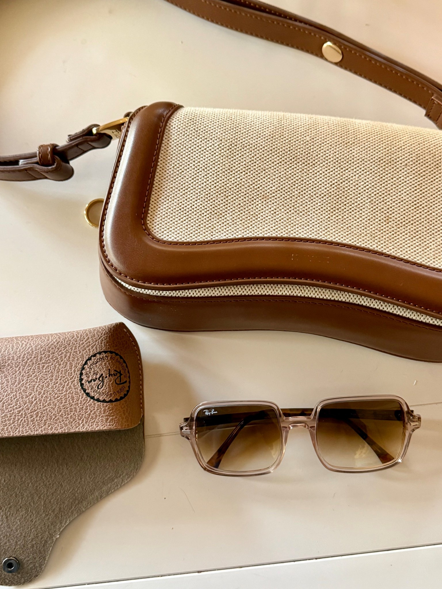 Recent amazon purse!🩵 
-ray bans sunglasses, purse, Amazon finds , spring 2026, vintage sunglasses, purse 

#LTKFestival #LTKTravel #LTKootd
