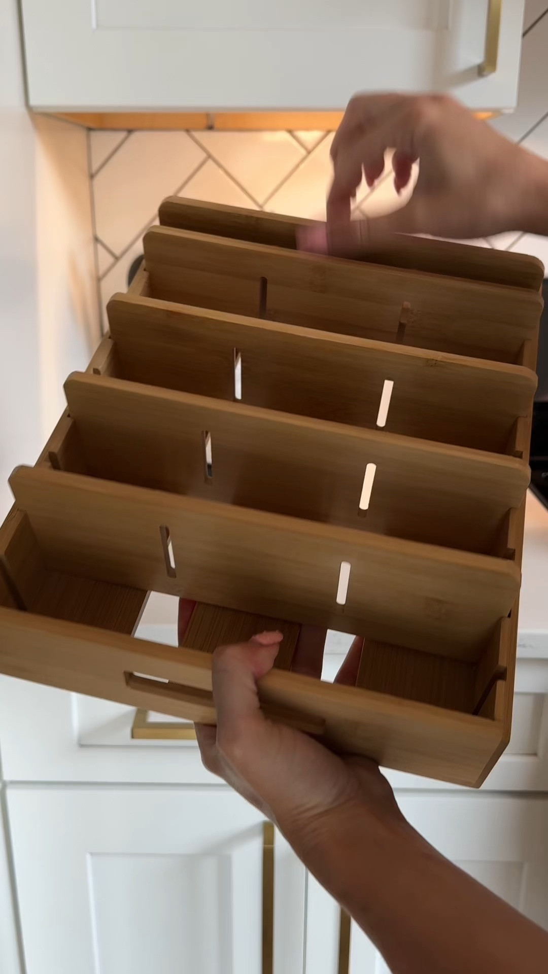 Cabinet + pantry organizers that have maximized our space! Can you tell I’m in nesting mode? Organizing the kitchen one cabinet at a time 🤪

Tupperware lid organizer, wrap + baggie acrylic door organizer, bamboo bottle organizer for cabinet

#LTKVideo #LTKHome