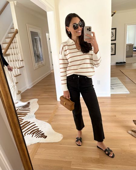 Kat Jamieson wears a stripe sweater and jeans with Hermes Oran sandals. Savette bag, casual outfit, spring outfit, denim. 

#LTKitbag #LTKSeasonal #LTKshoecrush