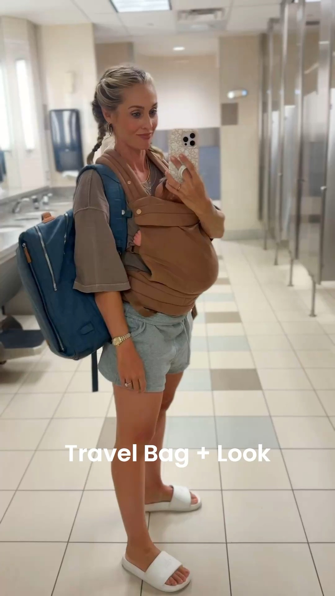 Airport travel look including travel / diaper bag, grey terry shorts, and dusty cocoa oversized tee. Plus my carrier! Shorts are large, tee is small!

#LTKFamily #LTKTravel #LTKBaby