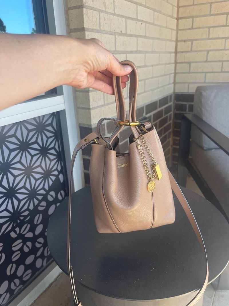 The perfect fall accessory! This Chloe Spin tote has the prettiest grained leather texture and the size is perfect for everyday wear without feeling oversized.

Chloé Spin tote, designer handbag, fall accessories, leather handbag, luxury handbag, everyday bag, fall style, neutral accessories, handbag collection, classic style, elevated accessories, CurlsandCashmere

#LTKSeasonal #LTKWorkwear #LTKootd