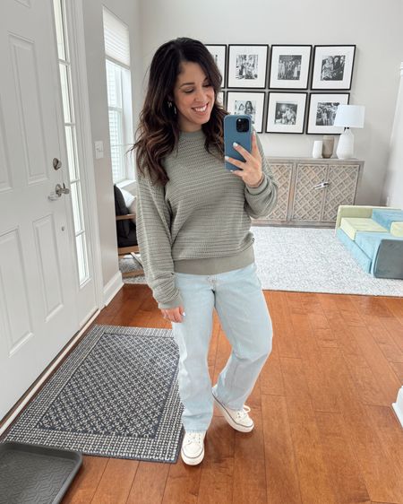 Took a casual spring outfit pic before I finished getting ready yesterday bc I didn’t want to forget to share these Abercrombie jeans and white sneakers! The jeans are a mid-rise, 90s cut in the “curve love” fit and seriously so comfy!! A little baggy, but still structured so they don’t totally overwhelm my short and curvy frame. The shoes are so comfy and cute! I wanted a pair of white platform sneakers that didn’t have a logo on them, and these fit the bill - and were under $100! As for the crochet sweater, it’s Varley and SO comfy. Definitely a splurge, but so worth it to me because it’s my favorite color and a classic spring sweater style I can keep and wear for years. This color is sold out, but I linked other great options. If you don’t want the sweater to feel oversized, size down. Jeans and shoes run true to size! Drop questions in the comments! 

#LTKshoecrush #LTKSeasonal #LTKfindsunder100