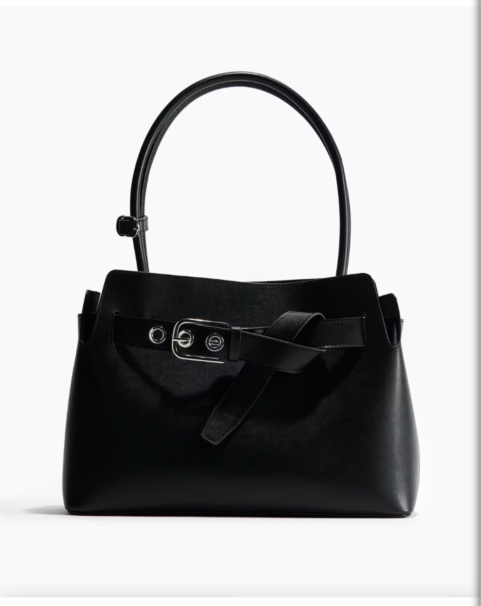 The ultimate work bag just dropped 👏 Sleek, structured, and fits everything I need for the office (and then some). Loving the minimal design with that edgy buckle detail — effortlessly chic for 9–5 and beyond. 🖤💼 #WorkBagGoals #LTKWorkwear #BagLover #OfficeStyle #LTKFinds #EverydayEssential #ChicAndFunctional