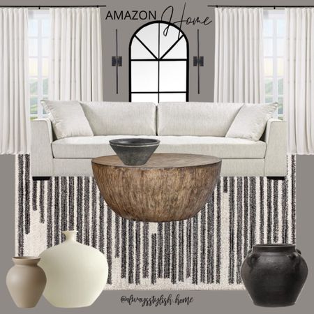 Living room inspo, home decor, white sofa, black vase, white vase, beige vase, wood drum coffee table, black bowl, black cream rug, arch top mirror, linen drapes curtains, thin modern sconce lighting 