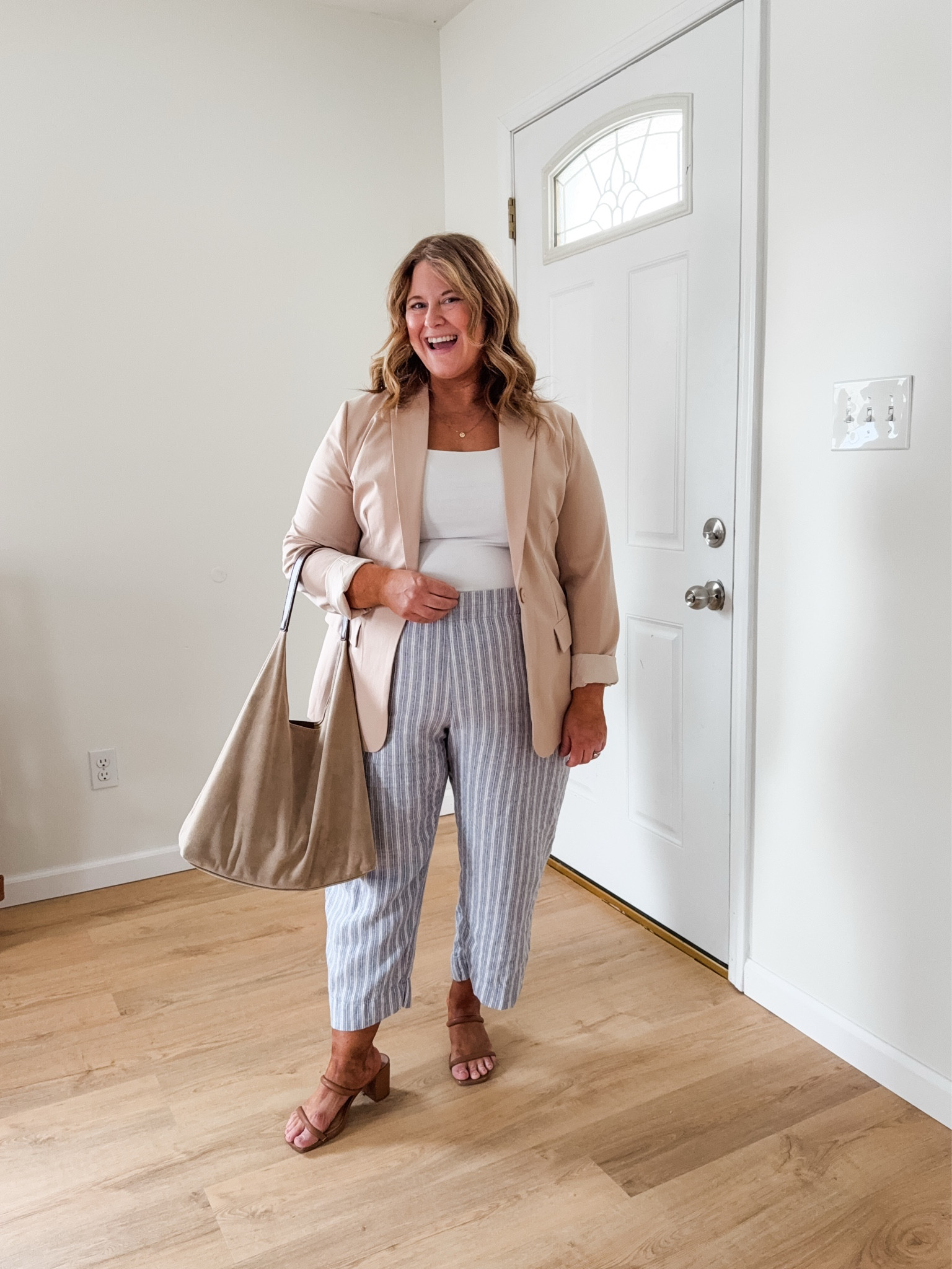 Wearing an XL in my linen pants (petite friendly at the regular length). XL in my tank and an XL in my blazer  

#LTKMidsize #LTKBump #LTKWorkwear