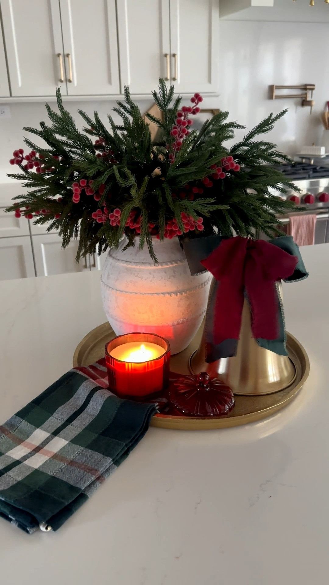 Kitchen centerpiece, Christmas centerpiece idea, Christmas kitchen, red and green holiday decor, gold tray, pine stems, berry branches, gold bell, Christmas kitchen towel, red Christmas candle, Amazon Christmas, Target holiday decorr

#LTKHoliday #LTKHome