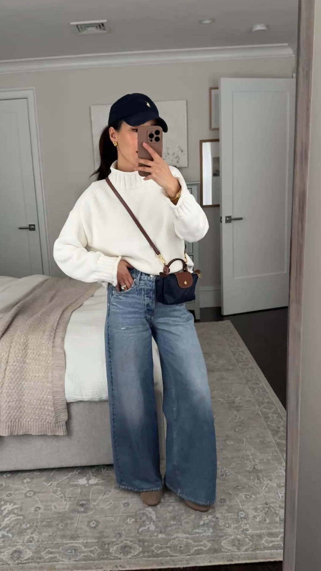 read below for denim sizing! Also linked their shortest 26.5” inseam version 

• Jcrew cotton sweater xxs, oversized slouchy fit, thicker knit, mine has shrunken a little bit in the dryer

• Rag and Bone “Miramar Sofie Ankle" jeans sz 23. Runs big so Go down 1 size at the waist for Miramar numerical sizing. “ankle” is actually long with a 30” inseam that I machine dried to shrink shorter to 27.5”.

To shorten: All Miramar styles shrink in length if machine dried. I machine dried on medium for about 20 min at a time and checked til it was the perfect length

If you are very petite then I also have the Andi Cropped style below with 26.5” inseam but KEEP out of machine dryer 

• Gentle Souls booties 5.5, size up half if between sizes. since the front toe felt a little narrow across. Very comfy 

• Longchamp mini bag with Amazon detachable strap kit

• Polo hat

Easy mom outfit, spring style , petite friendly sweatpants jeans, chunky sweater

#LTKmomlife #LTKPetite #LTKootd