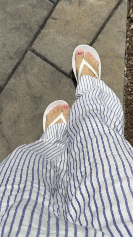 White flip flops and striped linen pants for spring and summer 2024 🩴 These Madewell pants are amazing! I sized down one size 

#LTKSeasonal #LTKxMadewell #LTKfindsunder100